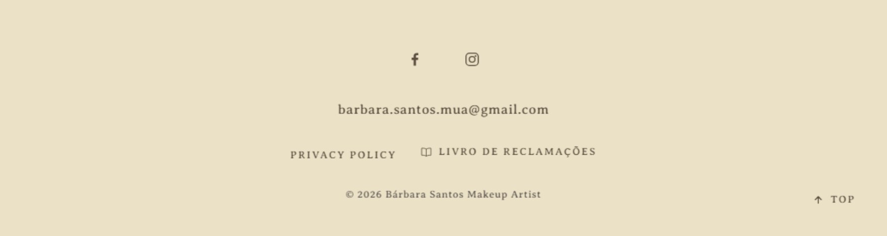 After: the same footer, with the email in dark text, a privacy policy and the complaints book